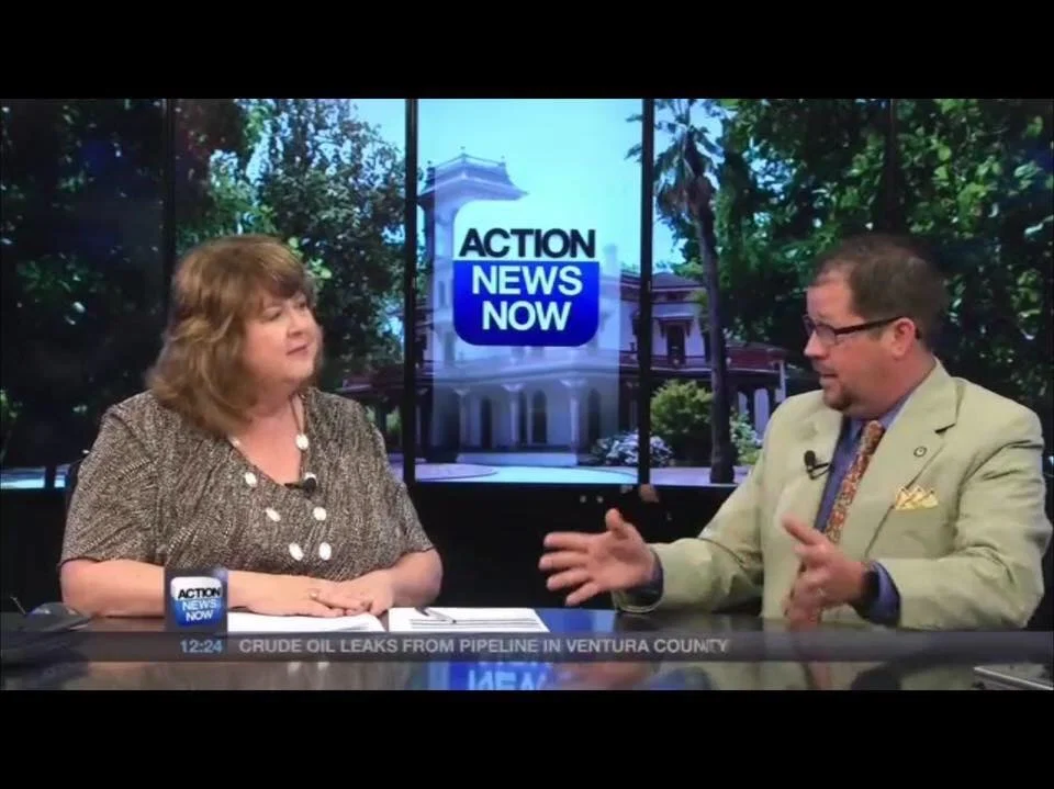 Television frame showing Randall Stone during an Action News Now interview
