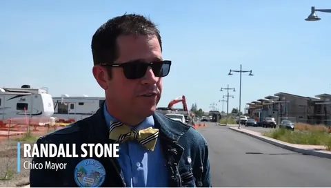 Randall Stone, as Chico mayor, interviewed at an active development site for a national post-Camp Fire housing report