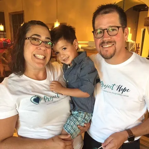 Krista Stone, Rhys Stone and Randall Stone wearing Project Hope of Butte County shirts