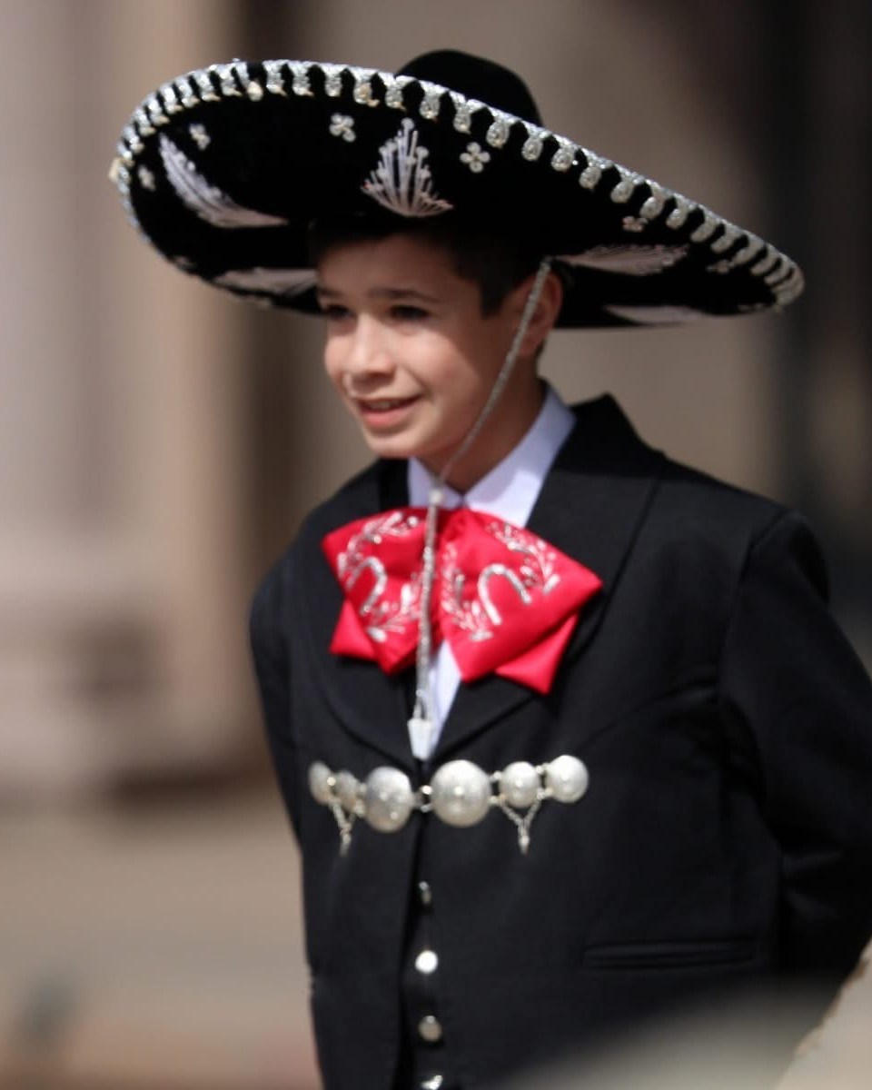 Rhys Stone in black charro attire and sombrero